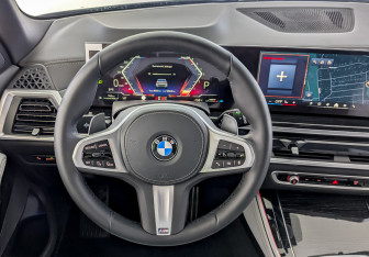 Подержанный автомобиль BMW X5 2025 года (22 фото)