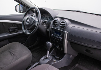 Подержанный автомобиль Nissan Almera Sedan 2013 года (10 фото)