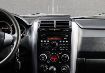 Подержанный автомобиль Suzuki Grand Vitara 2008 года (10 фото)