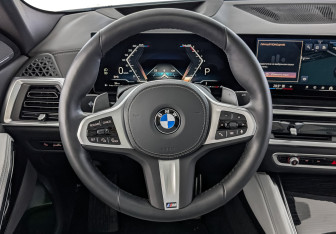 Подержанный автомобиль BMW X6 2025 года (22 фото)