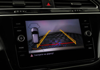 Подержанный автомобиль Volkswagen Tiguan 2018 года (14 фото)