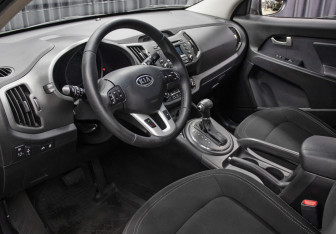 Подержанный автомобиль Kia Sportage 2012 года (14 фото)