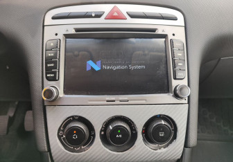 Подержанный автомобиль Peugeot 308 Hatchback 2009 года (14 фото)