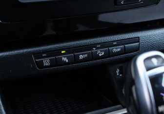 Подержанный автомобиль BMW X1 2014 года (16 фото)