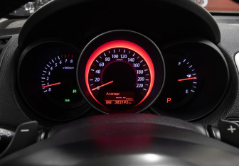 Подержанный автомобиль Kia Cerato Coupe 2012 года (13 фото)