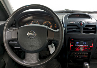 Подержанный автомобиль Nissan Almera Classic 2007 года (21 фото)