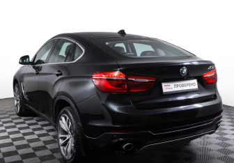 Подержанный автомобиль BMW X6 2016 года (7 фото)