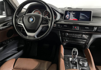 Подержанный автомобиль BMW X6 2016 года (15 фото)