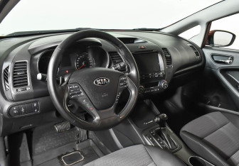 Подержанный автомобиль Kia Cerato Sedan 2014 года (11 фото)