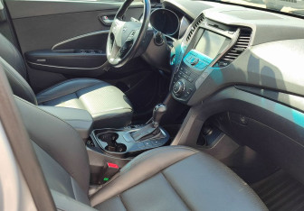 Подержанный автомобиль Hyundai Santa Fe 2013 года (9 фото)