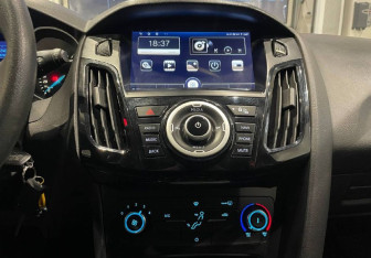 Подержанный автомобиль Ford Focus Wagon 2016 года (16 фото)