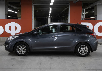 Подержанный автомобиль Hyundai i30 Hatchback 2015 года (8 фото)
