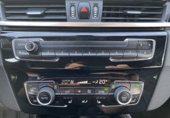 Подержанный автомобиль BMW X1 2016 года (16 фото)