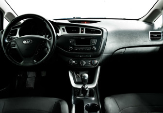 Подержанный автомобиль Kia Ceed Hatchback 2014 года (8 фото)