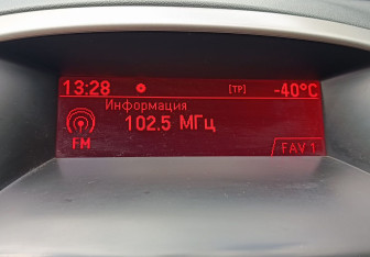 Подержанный автомобиль Opel Astra Wagon 2011 года (14 фото)