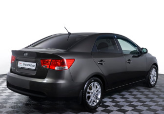 Подержанный автомобиль Kia Cerato Sedan 2011 года (5 фото)