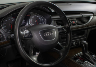 Подержанный автомобиль Audi A6 Sedan 2015 года (15 фото)