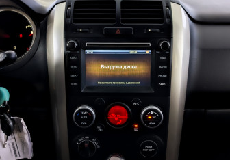 Подержанный автомобиль Suzuki Grand Vitara 2015 года (15 фото)