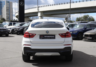 Подержанный автомобиль BMW X4 2015 года (6 фото)