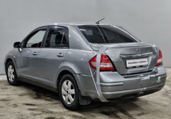 Подержанный автомобиль Nissan Tiida Sedan 2010 года (7 фото)