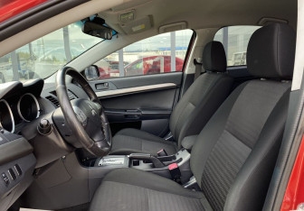 Подержанный автомобиль Mitsubishi Lancer Sedan 2012 года (18 фото)