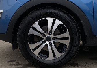 Подержанный автомобиль Kia Sportage 2012 года (9 фото)