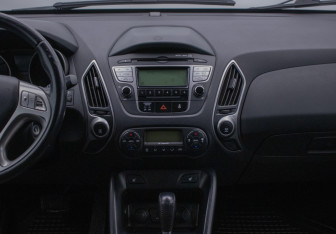 Подержанный автомобиль Hyundai ix35 2011 года (14 фото)