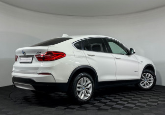 Подержанный автомобиль BMW X4 2016 года (2 фото)
