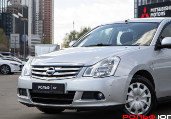 Подержанный автомобиль Nissan Almera Sedan 2014 года (14 фото)