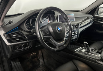 Подержанный автомобиль BMW X5 2015 года (12 фото)