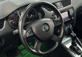 Подержанный автомобиль Skoda Octavia Liftback 2013 года (12 фото)