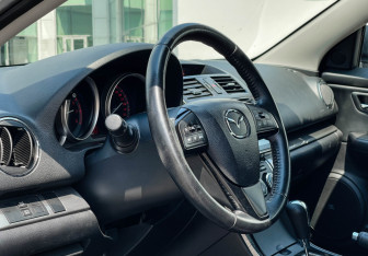 Подержанный автомобиль Mazda 6 Sedan 2010 года (13 фото)