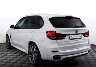 Подержанный автомобиль BMW X5 2014 года (7 фото)