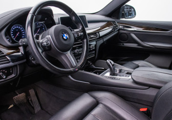 Подержанный автомобиль BMW X6 2018 года (9 фото)