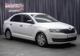 Подержанный автомобиль Skoda Rapid Liftback 2014 года (3 фото)