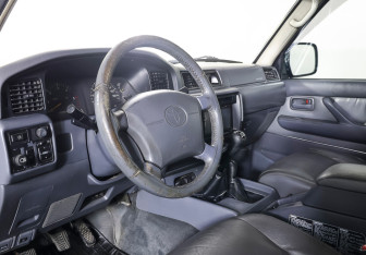 Подержанный автомобиль Toyota Land Cruiser Suv 1997 года (14 фото)