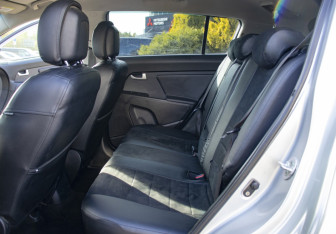 Подержанный автомобиль Kia Sportage 2012 года (10 фото)