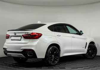 Подержанный автомобиль BMW X6 2018 года (2 фото)