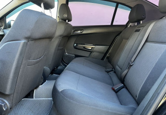 Подержанный автомобиль Opel Astra Sedan 2014 года (11 фото)