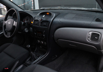 Подержанный автомобиль Nissan Almera Classic 2008 года (9 фото)