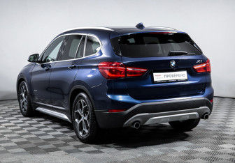Подержанный автомобиль BMW X1 2015 года (7 фото)