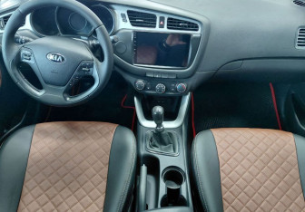 Подержанный автомобиль Kia Ceed Hatchback 2013 года (9 фото)