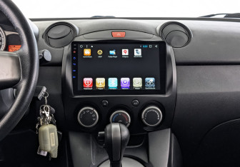 Подержанный автомобиль Mazda 2 Hatchback 2012 года (17 фото)