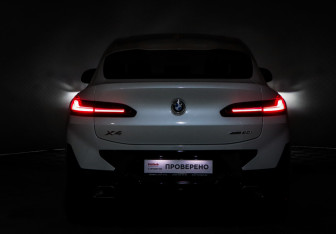Подержанный автомобиль BMW X4 2024 года (18 фото)