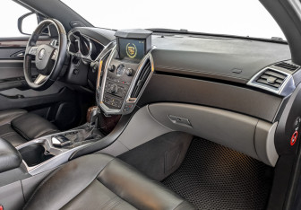 Подержанный автомобиль Cadillac SRX 2011 года (11 фото)