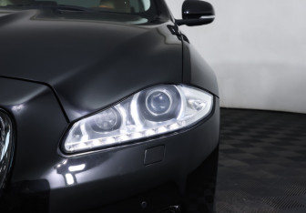 Подержанный автомобиль Jaguar XJ 2013 года (38 фото)