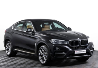 Подержанный автомобиль BMW X6 2014 года (3 фото)