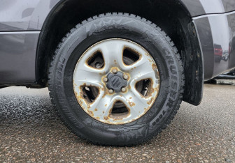 Подержанный автомобиль Suzuki Grand Vitara 2011 года (16 фото)