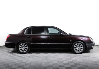 Подержанный автомобиль Kia Opirus 2009 года (4 фото)