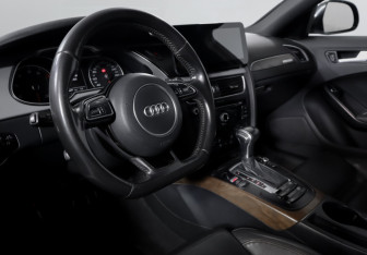 Подержанный автомобиль Audi A4 allroad 2015 года (14 фото)